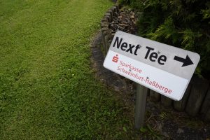 Next Tee Schild